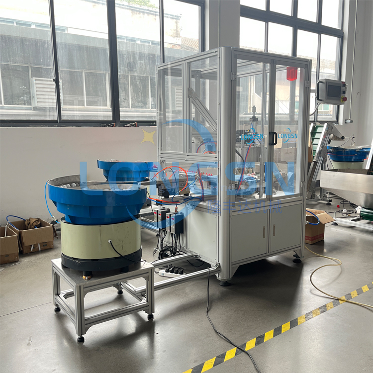 Μηχανή συναρμολόγησης καπακιού