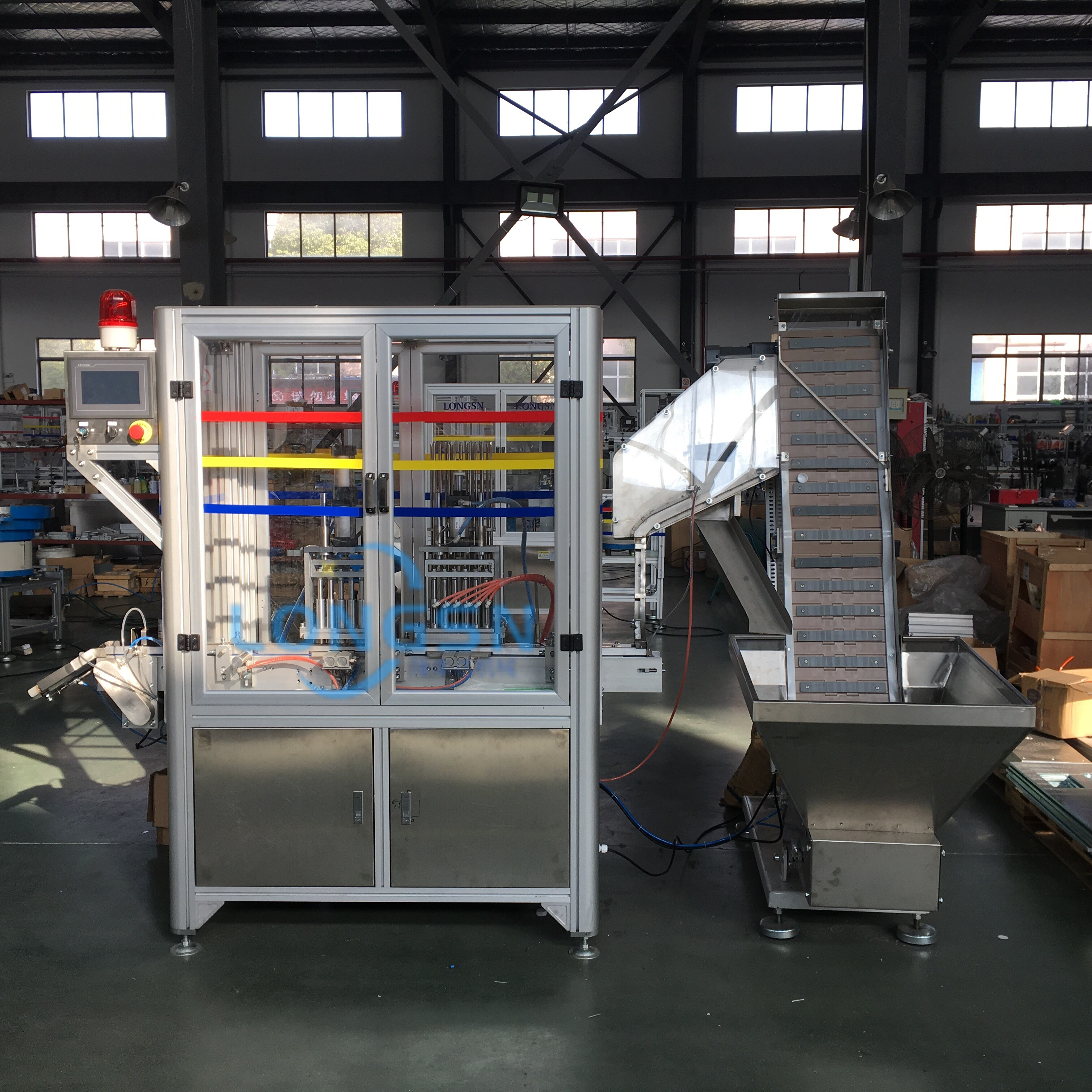 Μηχανή συναρμολόγησης καπακιού