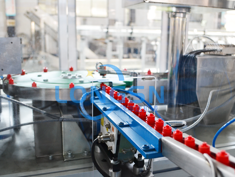 Μηχανή συναρμολόγησης καπακιού